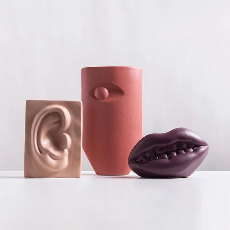 Eye ear and mouth vases