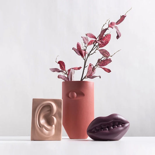 Eye ear and mouth vases