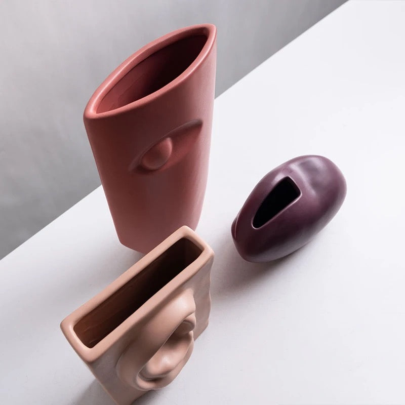 Eye ear and mouth vases