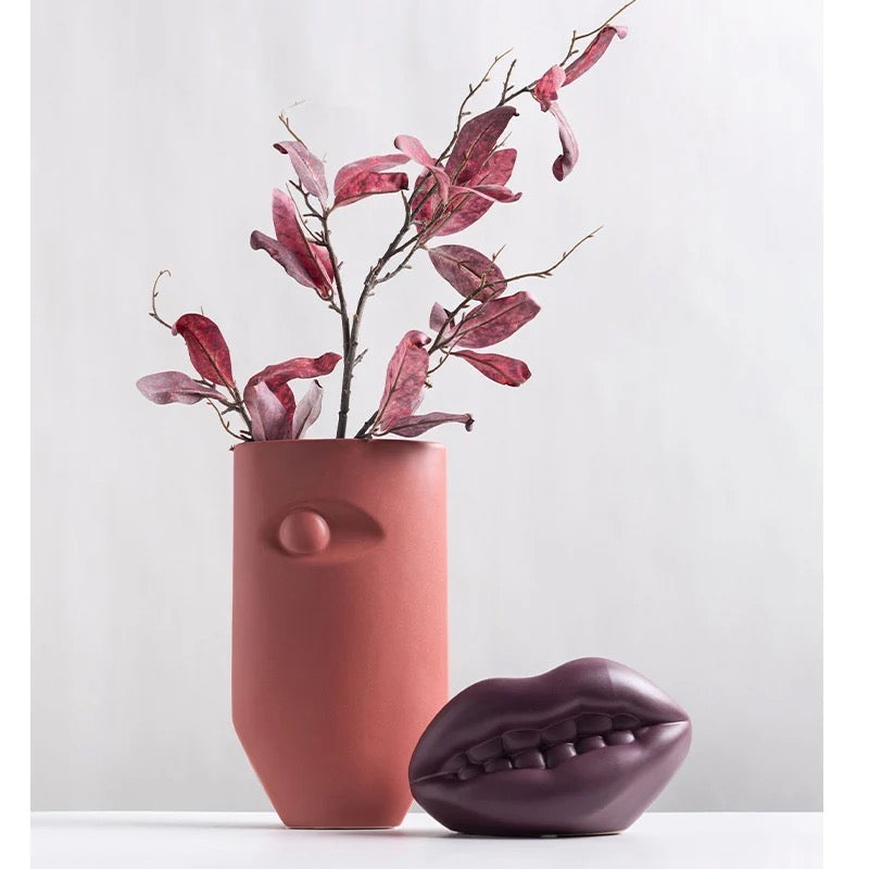 Eye ear and mouth vases